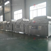 供應(yīng)山東小康牌700冷凍羊肉全自動真空包裝機(jī)
